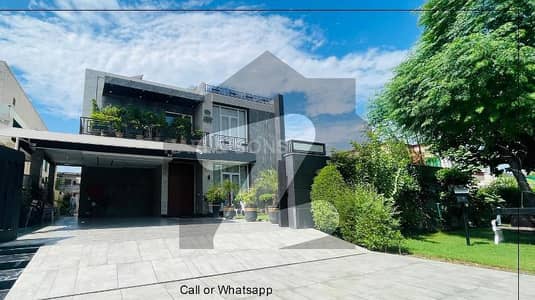 One Kanal Slightly Used Ultra-Modern Designer Bungalow 10 KV Solar Atached For Sale At Prime Location Of DHA Lahore