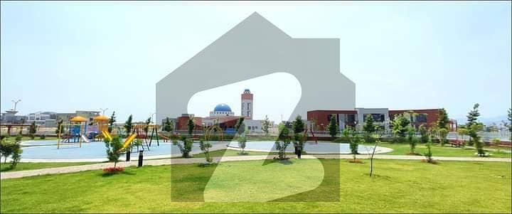 DHA PESHAWAR 1kanal CORNER plot very Close to Mosque Mart and Park in Sector B series 100.