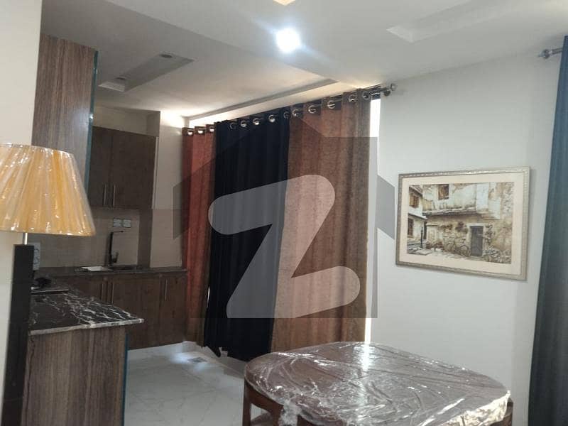 1 BED BEAUTIFUL FULL FURNISHED APARTMENT AVAILABLE FOR RENT AT HOT LOCATION RAFI BLOCK SECTOR E BAHRIA TOWN LAHORE NEAR SCHOOL PARK MASJID AND SUPER MARKET