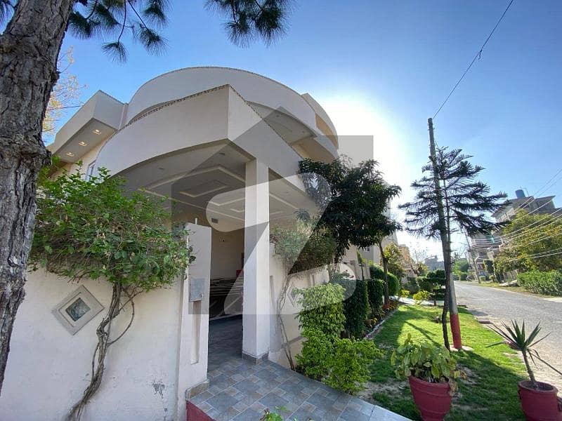 10 Marla like New used owner Build Corner House and 2 Marla Green lawn For sale in wapda Town