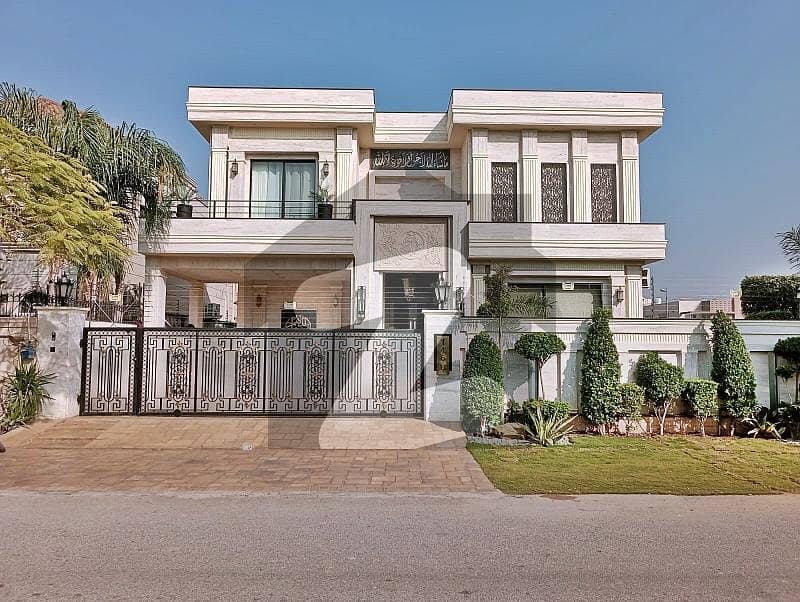 FACING PARK 1 KANAL ANTIQUE DESIGN WHITE VILLA FOR SALE IN PHASE 5 NEAR TO JALAL SONS.