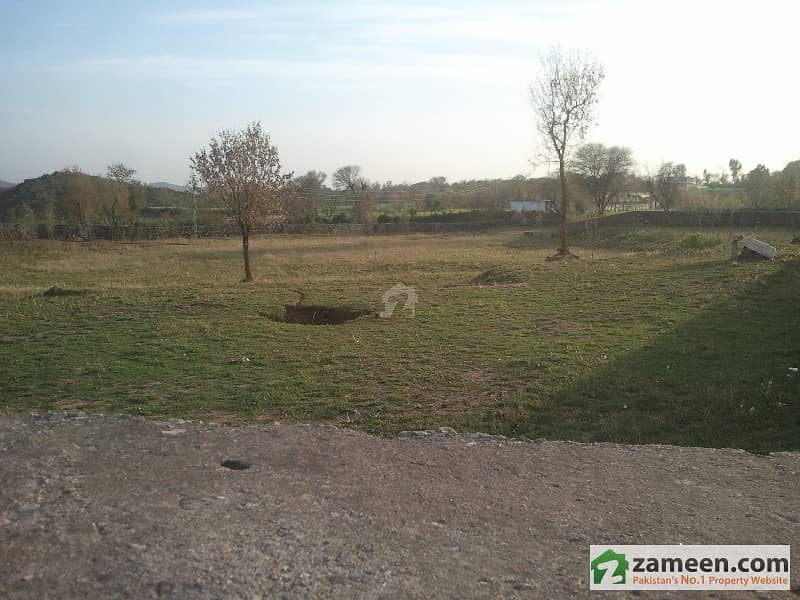 20 kanal open land farm house plot in CHAK SHAHZAD ISLAMABAD. 