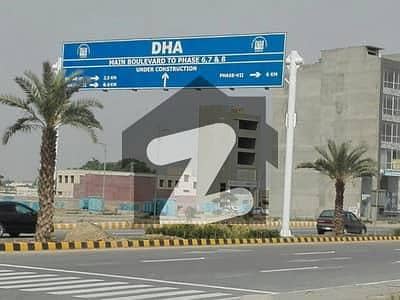 On 150 Ft Rd- 8 Marla Commercial Plot- Nex To CORNER- Top Location Phase 7 CCA2 DHA Lahore For Urgent Sale