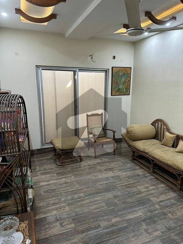 Semi-Furnished 2 bedroom flat in Sui Gas society near DHA phase 5