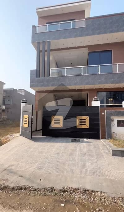 I14 brand new house for sale size6 marla asking price 300 lac double road back near park