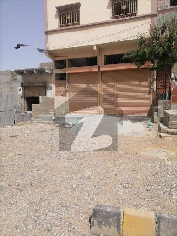 Prime Location House For Sale In Beautiful Baldia Town With 2 Shops
