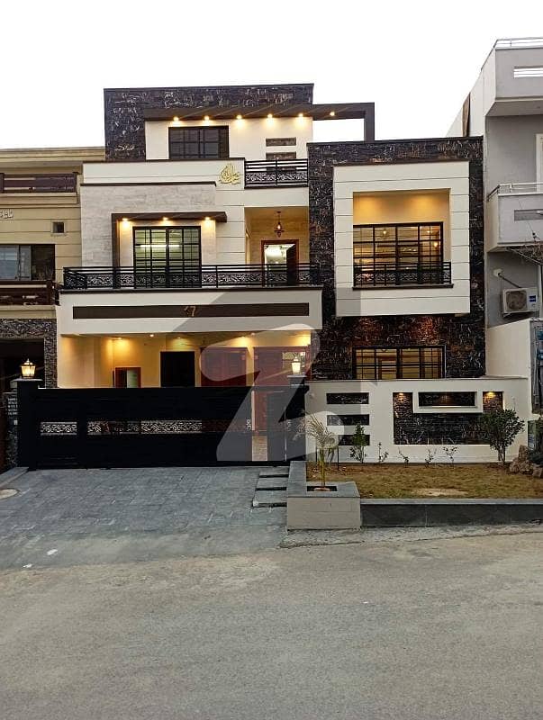 30x60 Brand New Modren Luxury House Available For sale in G_13 Rent value 1.80Lakh