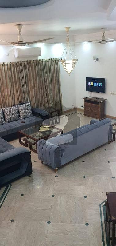 corner + facing park 12 Marla fully furnished house Available for Rent IN DHA phase 5