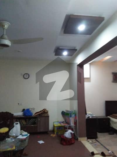 10 Marla House Is For Rent In Wapda Town Prime Location Near Park.