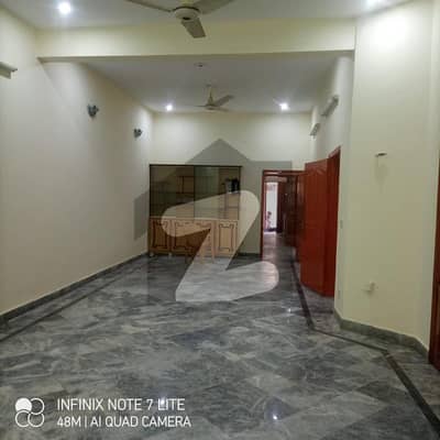 10 Marla Lower Portion Is For Rent In Wapda Town Prime Location Near Park.