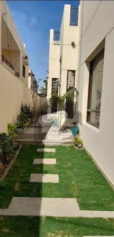 Serene Oasis: Luxurious 500 Sq. Yard Bungalow For Rent With Lush Garden And Modern Amenities