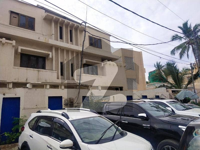 600 Sq Yards Ground Plus Two Bungalow Is Available For Commercial Activity Near Main Shahrah E Faisal