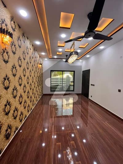 10 Marla Brand New Luxury House For Sale In Overseas A Bahria town Lahore Hot Location.