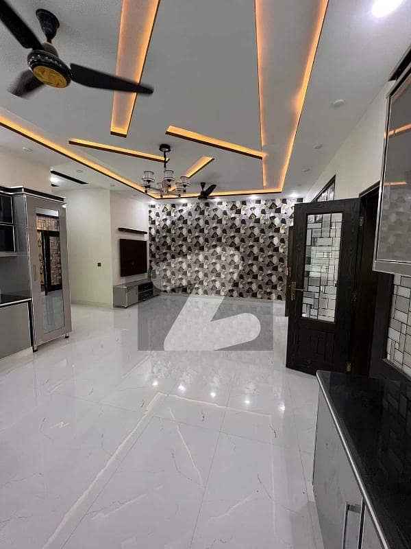 10 Marla Brand New Luxury House For Sale In Overseas A Bahria town Lahore Hot Location.