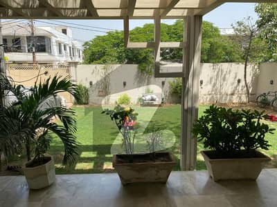 On Excellent Location 1000 Square Yards Beautiful Bungalow For sale IN DHA Phase 5.