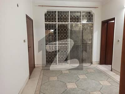 10 Marla Tile Floor Upper Portion is For Rent in Wapda Town Phase 1 Lahore Block F1.
