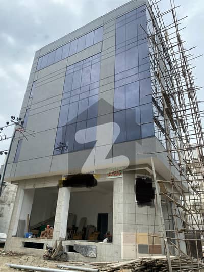 OFFICE BUILDING FOR RENT FULL GLASS ELEVATION 3 Side Corner Brand New Main khyaban e seher