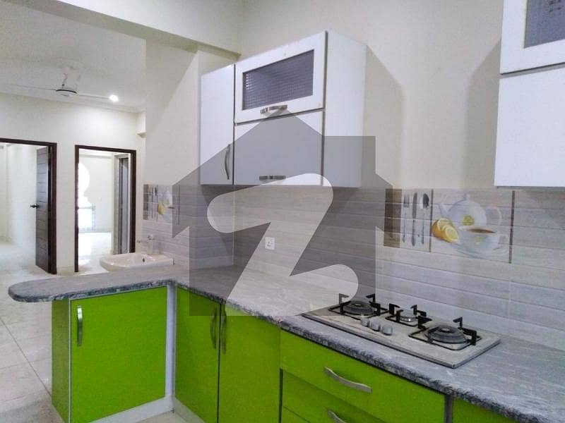 Prime Location 950 Square Feet Flat In Central Tauheed Commercial Area For sale