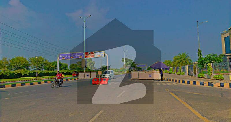 20 Marla Plot No Near ( C IN NUMBERING 900) Surrounding Houses Reasonable Price For Sale DHA Lhr PHASE 6