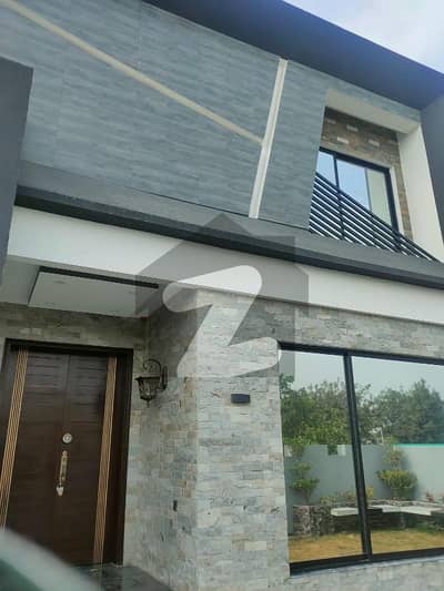 1 Kanal Brand New Modern Design House A-C Install Available For Rent In DHA Phase 7