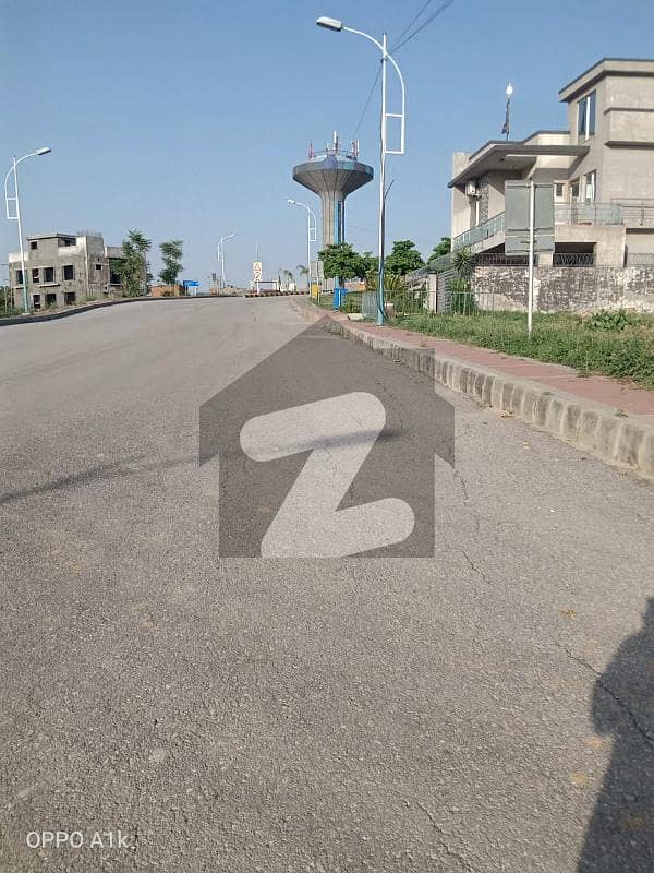 10 Marla Heighted, Park Facing Level and Solid Land & Non-Corner Plot for Sale on (Urgent Basis) on (Investor Rate) in Sector B Near Family Park in DHA 3