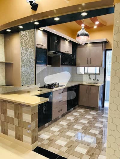 Fully Furnished Double-Story Residence: Next-to-Corner Beauty with Trendy New Bathrooms, Tiles, and Kitchen Available for Sale