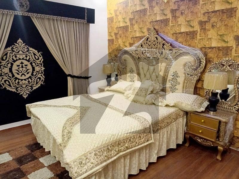 1 Kanal house for rent. 
4 bed rooms double unit. 
1 sinma house . 
Fully furnished. 
10 Marla parking & garden. 
10 Marla construction. 
2 side entrance. 
Location sector E bahria town phase 8 Rawalpindi. 
Demand 550.