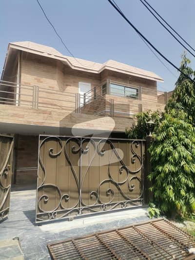 10 Marla Used Spanish Design Bungalow For Sale at Prime Location of DHA Lahore