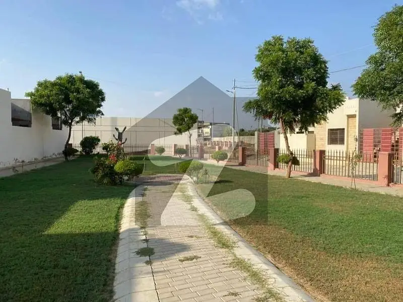 1000 Yards 4 Beds Bungalow For Sale At Most Alluring And Captivatig Location in Main Khayaban-e- mujahid Near Khayaban-e- Shujat In Dha Defence Phase 5,Karachi