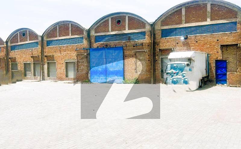 Lahore Quaid e Azam Industrial Estate 25,000 Sqft Warehouse with 22 feet Height, Docks available For Rent