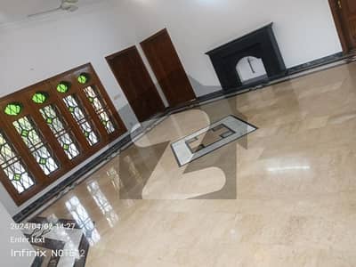 Spacious 6-Bedroom House for Rent in F11 with Green Lawn