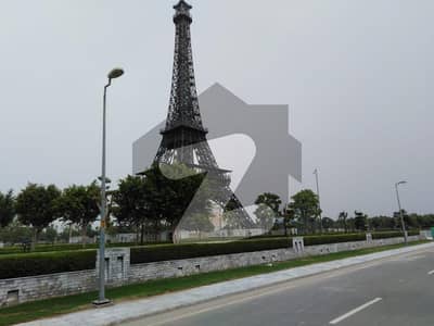 Prime location 5 marla Plot for sale in Eastern extention block with possession utility paid at brilliant location in bahria orchard lahore