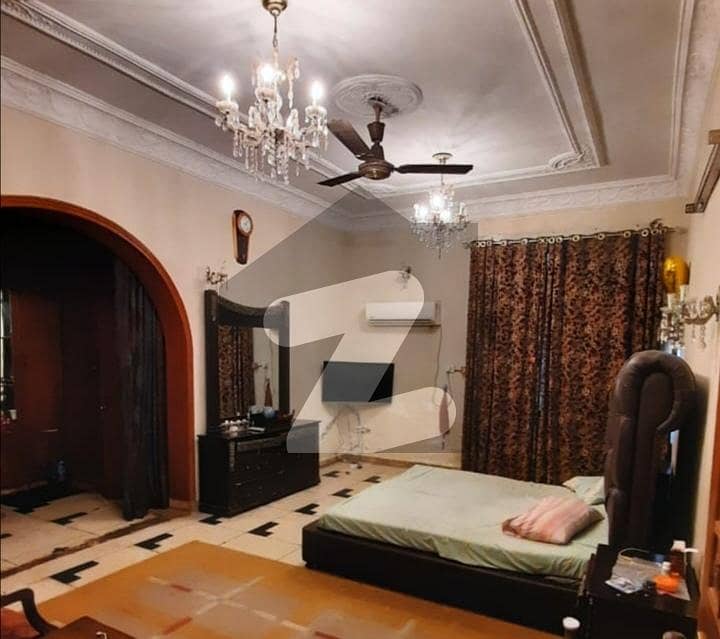 ماڈل ٹاؤن لاہور میں 10 کمروں کا 2 کنال مکان 25.0 کروڑ میں برائے فروخت۔