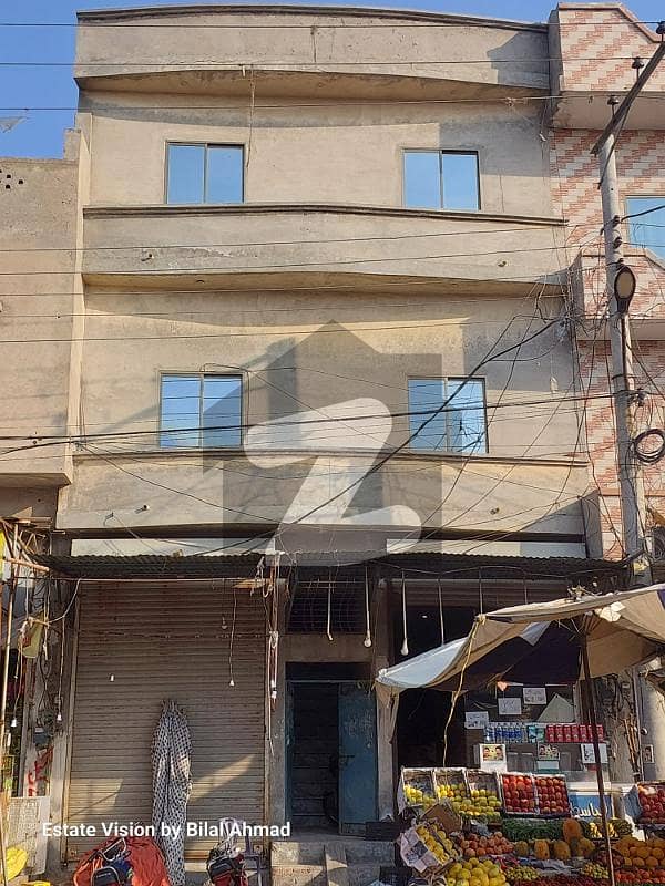 2 Marla 1st floor available for rent with 2 rooms 1 open kitchen 1bathin Madina Town