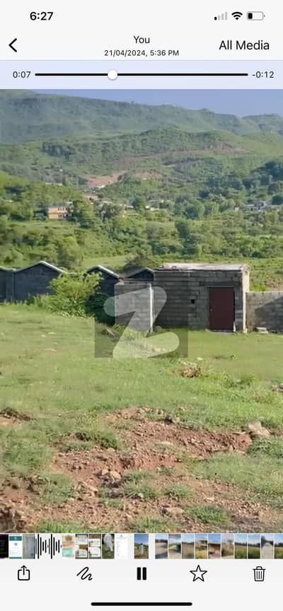 10 Kanal View Farm House Plot With 6+ Feet Boundary Wall And Garden. Water Bore Done