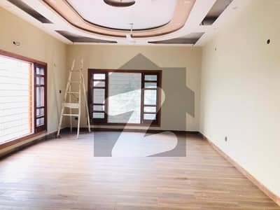 Brand New Portion Available For Rent Moderately Designed 600 Square Yards 4 Bed Drawing Dining With Study Room And Powder Washroom At KDA Scheme No 01, NEAR Karsaz ROAD Is Available For Rent