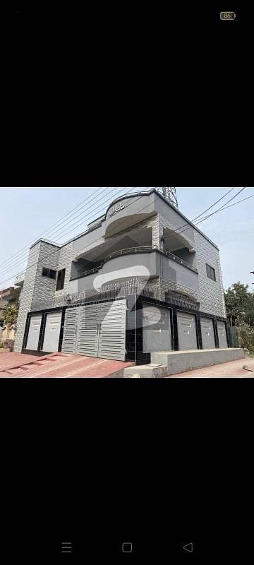 5 Marla corner facing park new house for sale in new sattilite town in X block near telephone exchange.