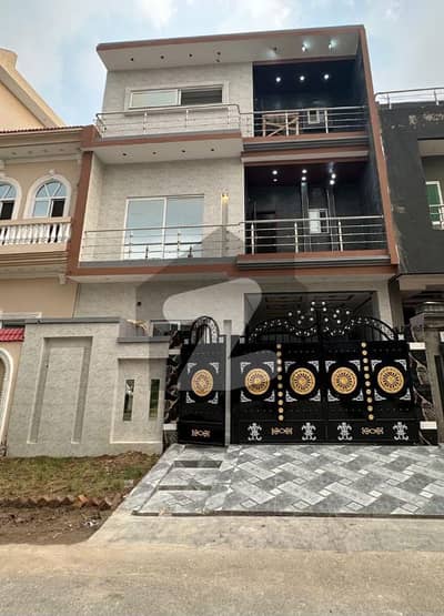 5 Marla Triple Storey Luxury Brand new 5 Bed House Available For Sale In E Block Canal Garden Lahore