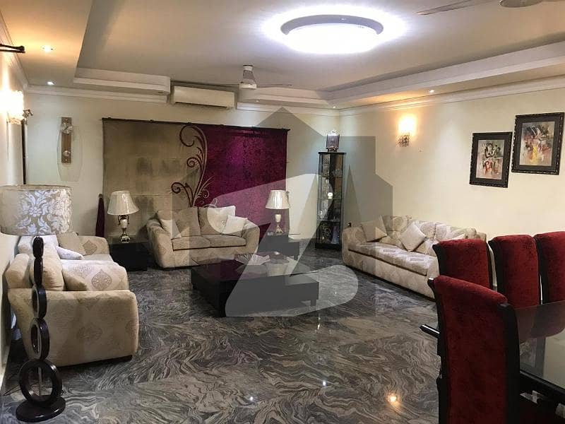 Semi Furnished 20 Marla Modern bungalow Near Wateen Chowk Block-G available For Rent In DHA Phase-5 Park View Lahore Super Hot Location.