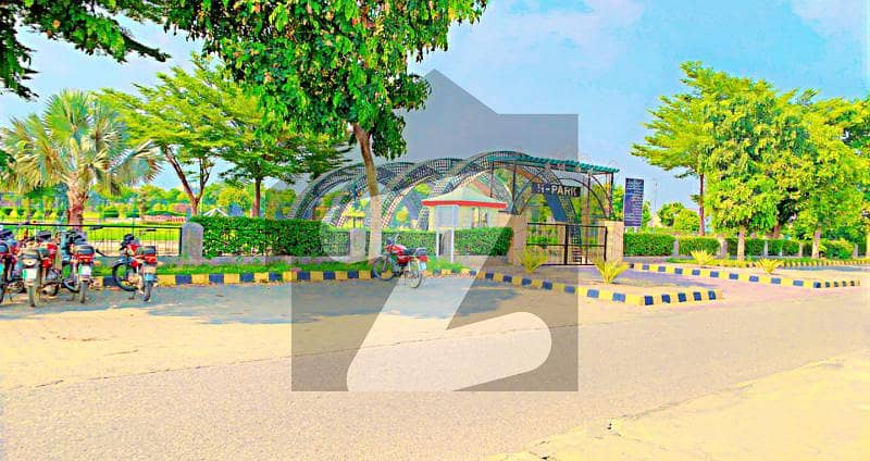 20 Marla Plot No Near In Block ( 1290/66 U) Surrounding Houses Reasonable Price For Sale DHA Lahore