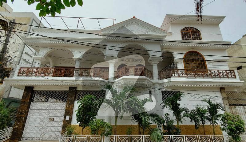 Spacious 8-Bedroom House for Sale in Gulshan-e-Iqbal, Block 4A