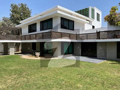 Exquisite 1000 Sqyd Bungalow with Lush Green Garden in DHA Karachi