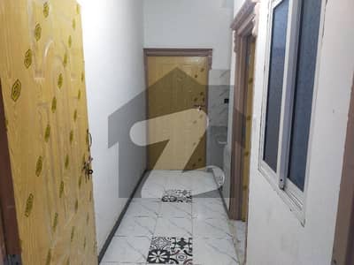 Flat for rent in commercial market satellite town.
