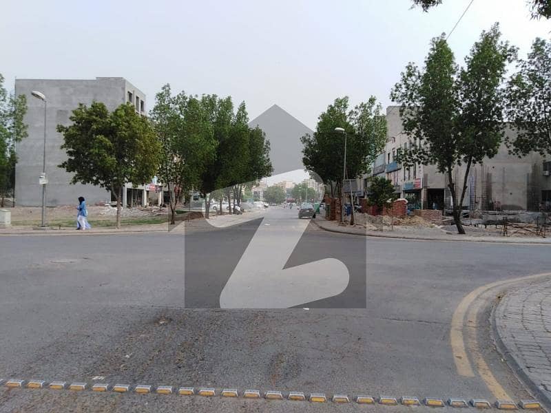 5 marla plot for sale in b block with possession utility paid at brilliant location in bahria orchard lahore