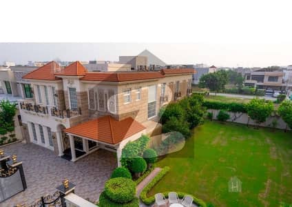 TOTAL 2KANAL 1 KANAL HOUSE and 1 KANAL LOWN SWIMMING POOL+HOME THEATER And SANOKER TABLE BRAND NEW MOST BEAUTIFUL LUXURY BUNGALOW AT A GOOD LOCATION NEAR TO DEFANCE RAYA AND PARK