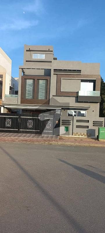 10 Marla House Is Available For Sale In Bahria Town Overseas B Extension Block Lahore. this house is as like dream house.