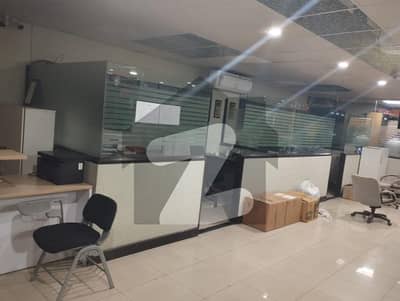 WELL MAINTAINED SEMI FURNISHED OFFICE IS AVAILABLE ON THE RENT IN THE 24/7 COMMERRICAL BULING AT MAIN SHAHR E FAISAL