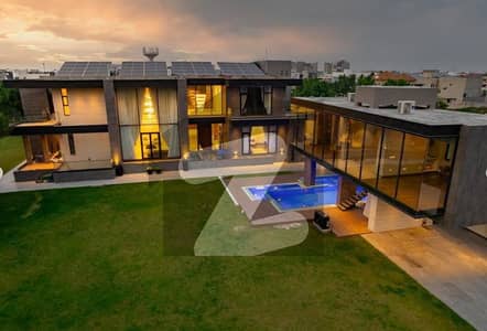 Total 4 KANAL, 2 Kanal Lash Green Lawn + 2 Kanal Brand New Luxury Ultra-Modern Design Most Beautiful Fully Furnished Swimming Pool Bungalow For Sale At Prime Location Of DHA Lahore