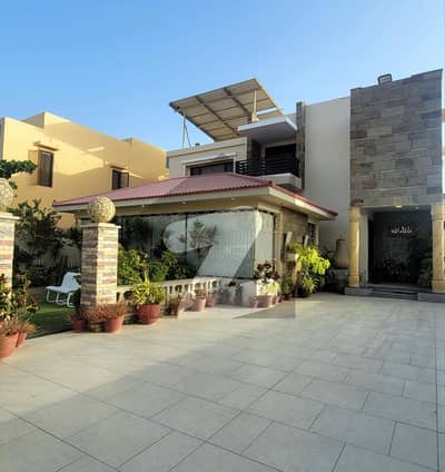 ڈی ایچ اے فیز 6 ڈی ایچ اے ڈیفینس,کراچی میں 6 کمروں کا 2 کنال مکان 23.0 کروڑ میں برائے فروخت۔