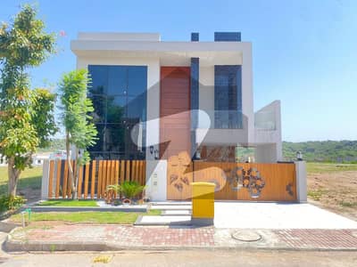 BRAND NEW LUXURY DESIGNER HOUSE WITH 10 MARLA EXTRA LAND LAWN FOR SALE